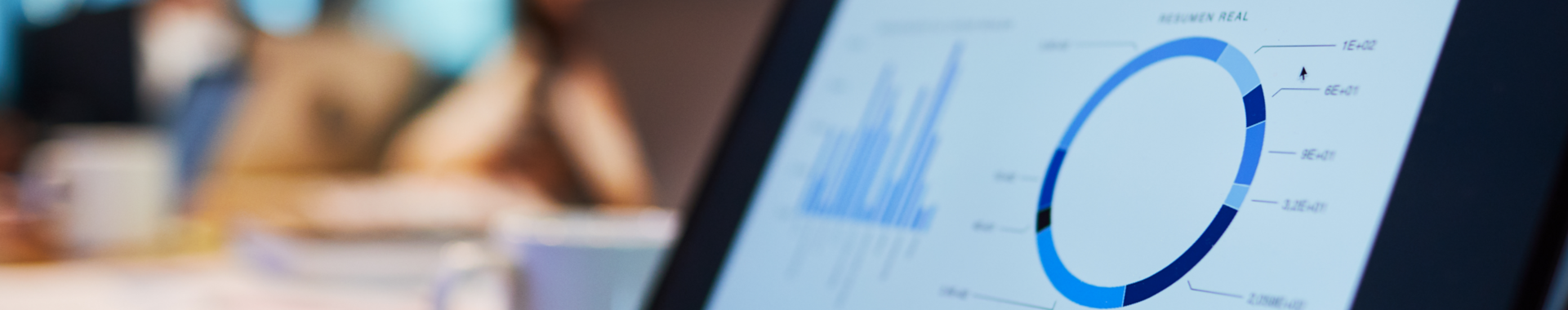Close up view of a laptop with a business chart on the screen