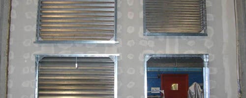 A fire resistant wall being tested in a facility. 