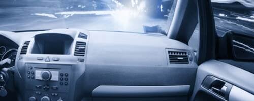 The passenger view of someone riding in a car