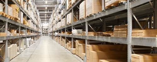 Row of shelves with boxes in warehouse