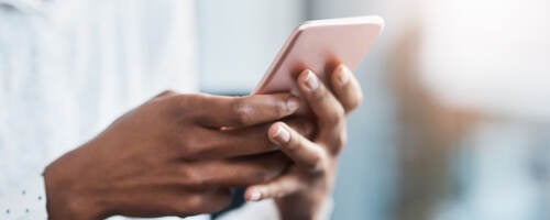 A businessperson using a mobile phone