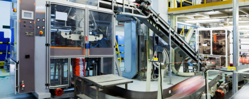 Industrial machinery and systems at a manufacturing facility