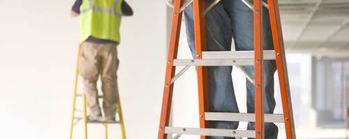 workers on ladders
