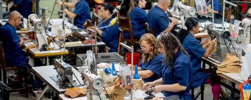 Manual workers working at a factory.