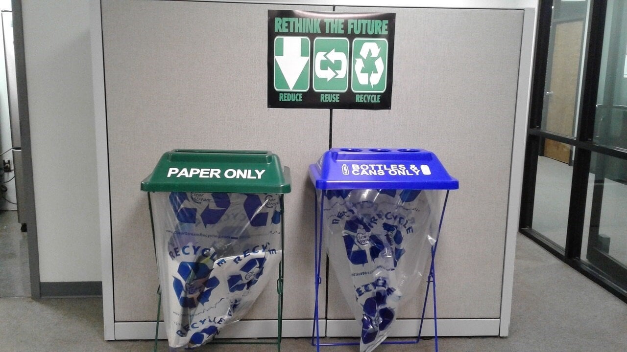 BASF recycling station example which consists of one container for paper and one container for cans/bottles