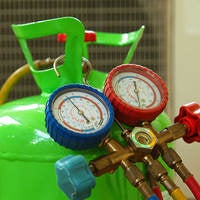 closeup of gas cylinders with valves