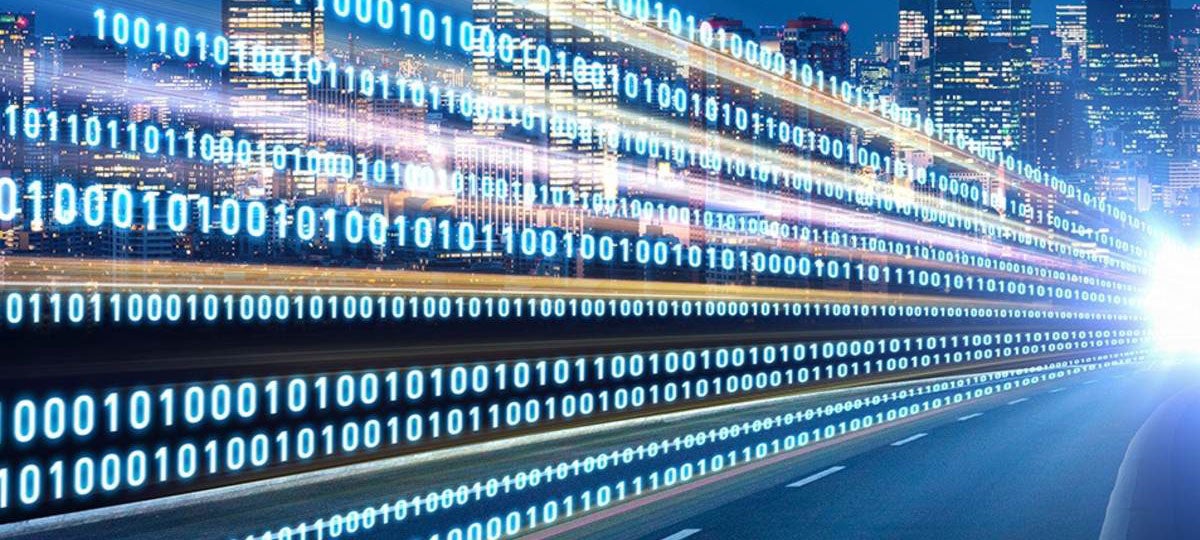 Binary code along an urban city highway at night