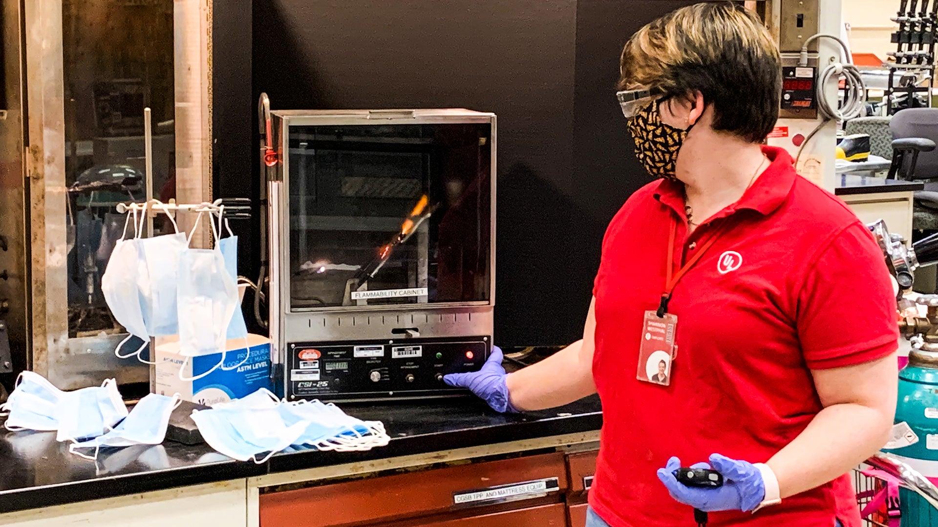 UL employee testing masks in a laboratory