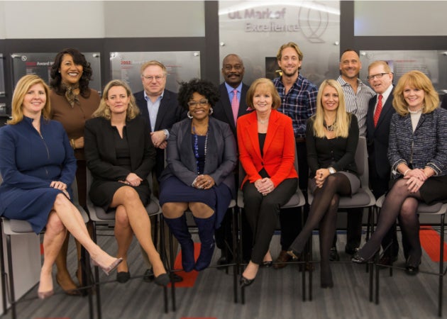 A group of female and male UL leaders come together after hosting a Women in Leadership event