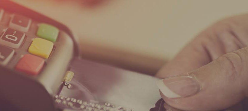 Close up view of a transaction with a chip reader